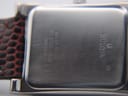 Close-up of the polished stainless steel case back, showing 'WATER RESIST ST. STEEL BACK' and model reference C860209 engraving.