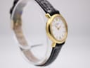 Another angled side view of the Tissot C226K, focusing on the gold case and lugs with the black leather strap.