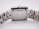 Close-up of the stainless steel case back of the Tissot L730K, showing model number, sapphire crystal, and 30m water resistance.