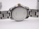 Close-up of the polished stainless steel case back with Tissot 1853, model number T049210 A, and water resistance engravings.