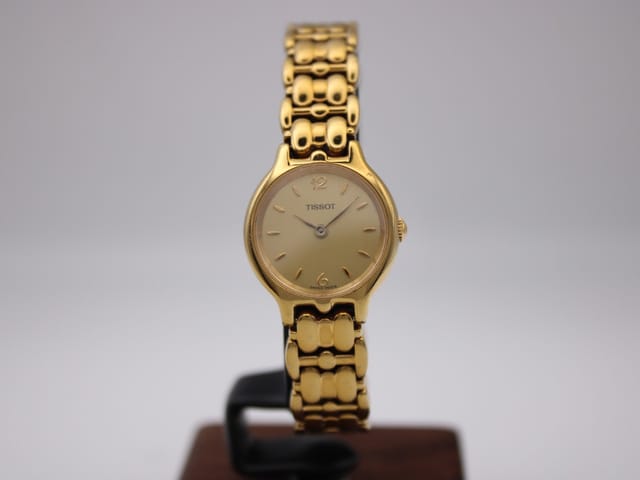 TISSOT E421K — photo 1