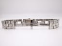 View of the Gucci 2300L's stainless steel bracelet opened, showing the butterfly clasp with 'GUCCI' branding.