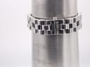 Close-up of the Gucci 2300L bracelet clasped around a wrist sizing gauge, indicating a wrist size of approximately 172mm.