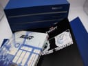 A collection of the original Tissot manuals and history booklets included with the watch.