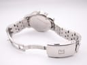 Interior view of the Tissot stainless steel bracelet and fold-over clasp, showing its construction and 'STAINLESS STEEL' engraving.