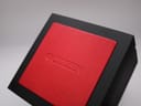 Top view of the black presentation box with a red lid, featuring the embossed "CITIZEN" logo.