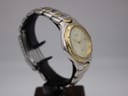 Another side view of the Citizen two-tone watch, highlighting the case profile and bracelet links.
