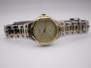 Oblique front view of the Citizen two-tone watch, showing the full bracelet stretched out.