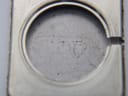 Interior view of the watch case back, showing 'R. WEIL LTD SWISS' engraving on the stainless steel.