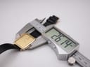 Digital caliper measuring the case width of the Raymond Weil 713 watch, displaying 26.14 mm.