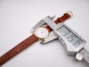 Digital caliper measuring the case diameter of the Raymond Weil 5514 watch, showing a reading of 31.51mm.